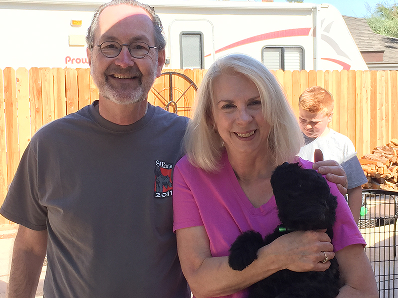 An image of Penelope and William Ogden of Limerick Bouvier des Flandres with puppy, Lacey